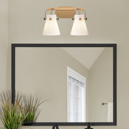 A large image of the Innovations Lighting 423-2W-10-17 Pilaster II Cone Vanity Alternate Image