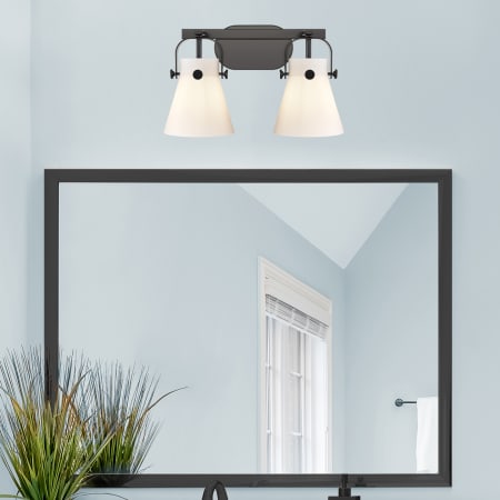 A large image of the Innovations Lighting 423-2W-10-17 Pilaster II Cone Vanity Alternate Image