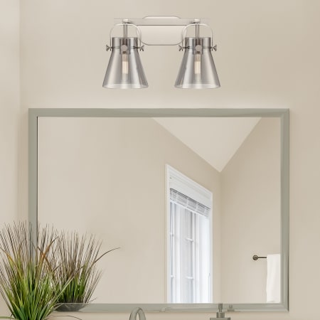 A large image of the Innovations Lighting 423-2W-10-17 Pilaster II Cone Vanity Alternate Image