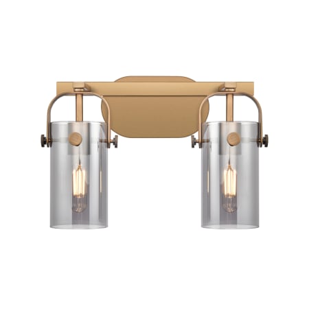 A large image of the Innovations Lighting 423-2W-10-15 Pilaster II Cylinder Vanity Brushed Brass / Plated Smoke