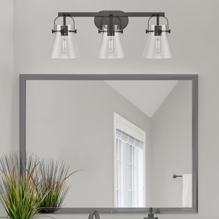 A large image of the Innovations Lighting 423-3W-10-27 Pilaster II Cone Vanity Alternate Image