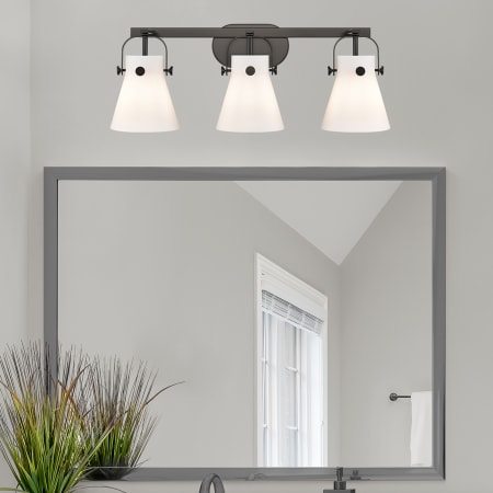 A large image of the Innovations Lighting 423-3W-10-27 Pilaster II Cone Vanity Alternate Image