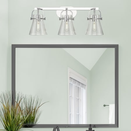 A large image of the Innovations Lighting 423-3W-10-27 Pilaster II Cone Vanity Alternate Image