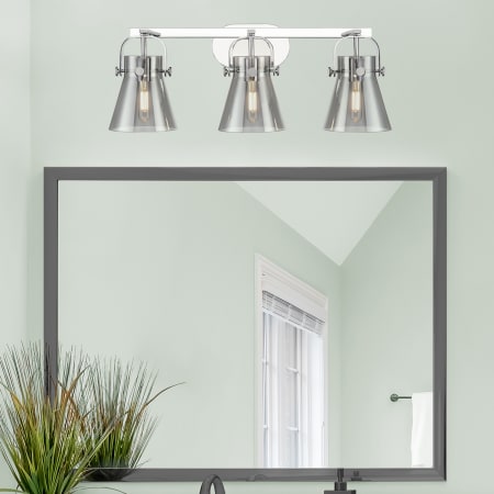 A large image of the Innovations Lighting 423-3W-10-27 Pilaster II Cone Vanity Alternate Image