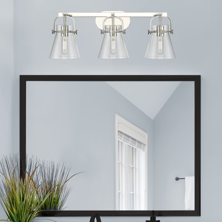 A large image of the Innovations Lighting 423-3W-10-27 Pilaster II Cone Vanity Alternate Image