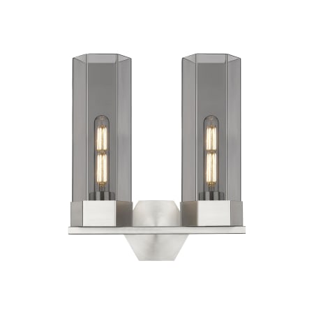 A large image of the Innovations Lighting 427-2W-17-14 Claverack Vanity Satin Nickel / Plated Smoke