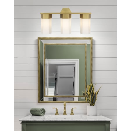 A large image of the Innovations Lighting 427-3W-12-23 Claverack Vanity Alternate Image