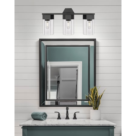 A large image of the Innovations Lighting 427-3W-12-23 Claverack Vanity Alternate Image