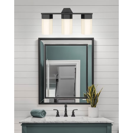 A large image of the Innovations Lighting 427-3W-12-23 Claverack Vanity Alternate Image