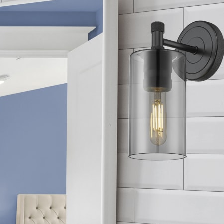 A large image of the Innovations Lighting 434-1W-7-4 Crown Point Sconce Alternate Image