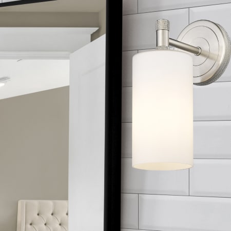 A large image of the Innovations Lighting 434-1W-7-4 Crown Point Sconce Alternate Image