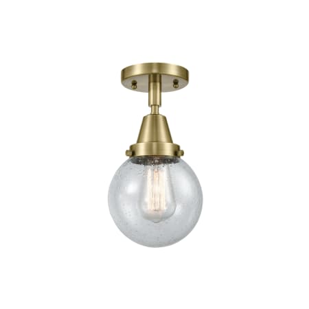 A large image of the Innovations Lighting 447-1C-11-6 Beacon Semi-Flush Antique Brass / Seedy