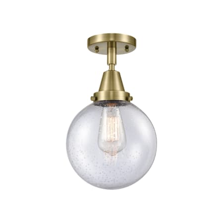 A large image of the Innovations Lighting 447-1C-13-8 Beacon Semi-Flush Antique Brass / Seedy