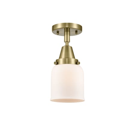 A large image of the Innovations Lighting 447-1C-10-5 Bell Semi-Flush Antique Brass / Matte White