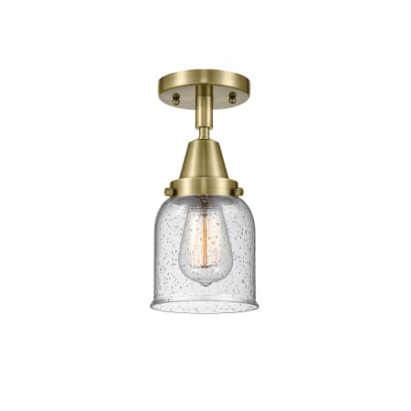 A large image of the Innovations Lighting 447-1C-10-5 Bell Semi-Flush Antique Brass / Seedy