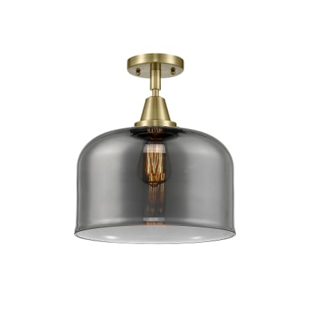 A large image of the Innovations Lighting 447-1C-13-12-L Bell Semi-Flush Antique Brass / Plated Smoke