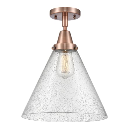 A large image of the Innovations Lighting 447-1C-16-12-L Cone Semi-Flush Antique Copper / Seedy