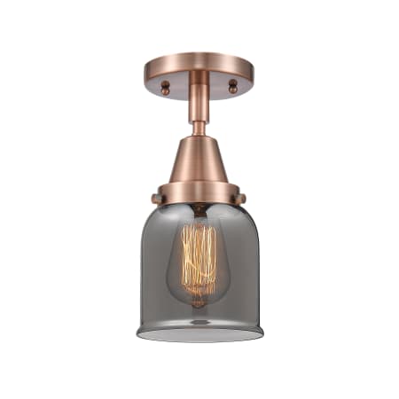 A large image of the Innovations Lighting 447-1C-10-5 Bell Semi-Flush Antique Copper / Plated Smoke