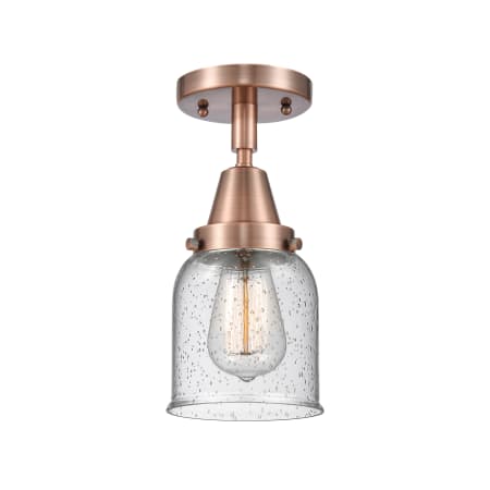 A large image of the Innovations Lighting 447-1C-10-5 Bell Semi-Flush Antique Copper / Seedy
