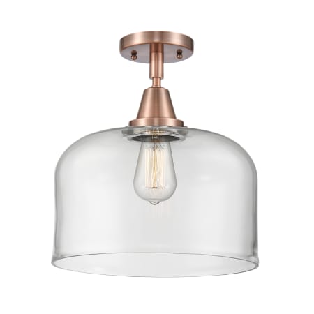 A large image of the Innovations Lighting 447-1C-13-12-L Bell Semi-Flush Antique Copper / Clear