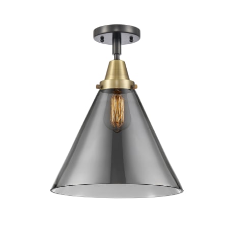 A large image of the Innovations Lighting 447-1C-16-12-L Cone Semi-Flush Black Antique Brass / Plated Smoke