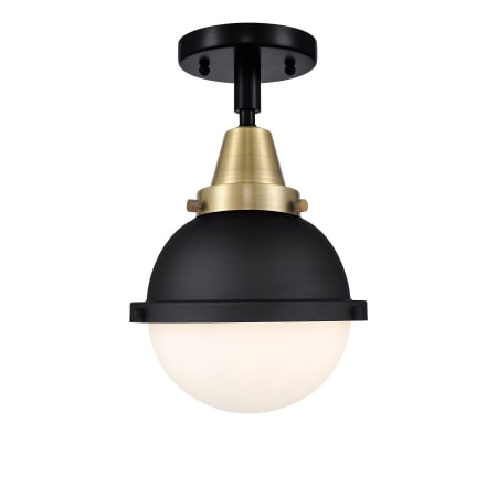 A large image of the Innovations Lighting 447-1C-12-8 Hampden Semi-Flush Black Antique Brass / Matte White