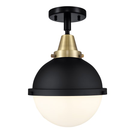 A large image of the Innovations Lighting 447-1C-14-9 Hampden Semi-Flush Black Antique Brass / Matte White