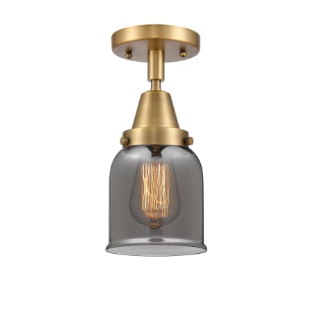 A large image of the Innovations Lighting 447-1C-10-5 Bell Semi-Flush Brushed Brass / Plated Smoke