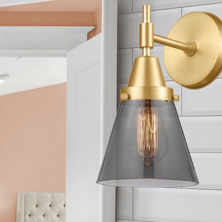 A large image of the Innovations Lighting 447-1W-11-7 Cone Sconce Alternate Image