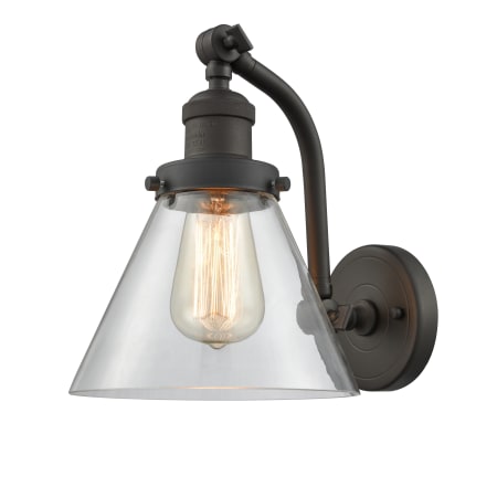 A large image of the Innovations Lighting 515-1W Large Cone Oiled Rubbed Bronze / Clear