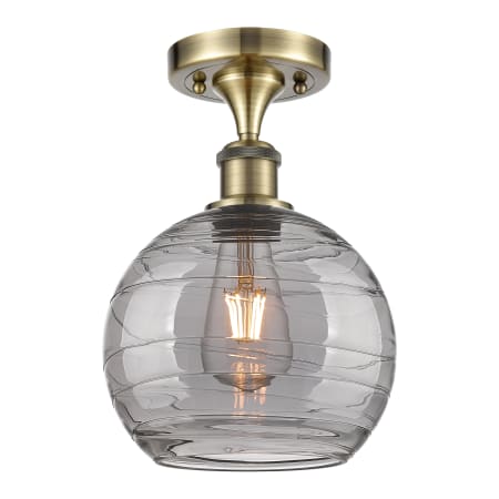 A large image of the Innovations Lighting 516-1C-12-8 Athens Semi-Flush Antique Brass