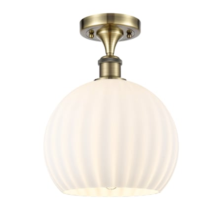 A large image of the Innovations Lighting 516-1C-13-10 White Venetian Semi-Flush Antique Brass