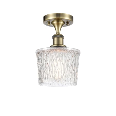 A large image of the Innovations Lighting 516-1C-11-7 Niagra Semi-Flush Antique Brass / Clear
