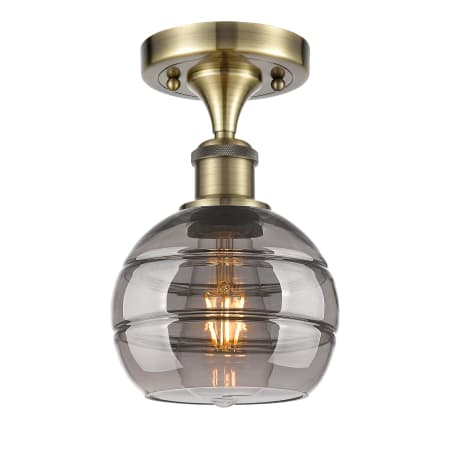 A large image of the Innovations Lighting 516-1C-10-6 Rochester Semi-Flush Antique Brass / Smoked