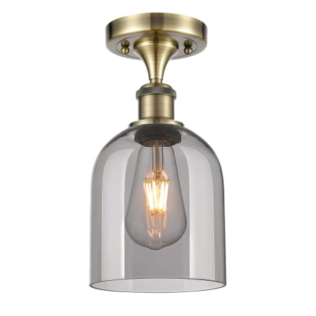 A large image of the Innovations Lighting 516-1C-11-6 Bella Semi-Flush Antique Brass / Smoked