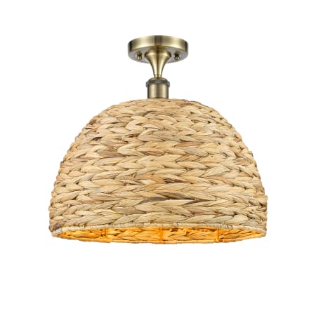A large image of the Innovations Lighting 516-1C-15-16 Woven Rattan Semi-Flush Antique Brass / Natural