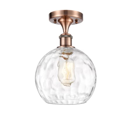 A large image of the Innovations Lighting 516-1C-13-8 Athens Semi-Flush Antique Copper / Clear Water Glass