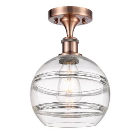 A large image of the Innovations Lighting 516-1C-12-8 Rochester Semi-Flush Antique Copper / Clear