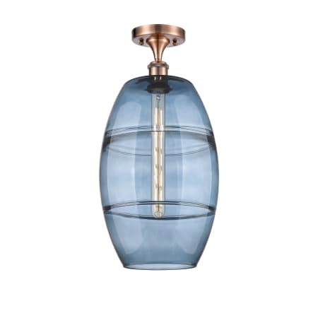 A large image of the Innovations Lighting 516-1C-20-10 Vaz Semi-Flush Antique Copper / Blue