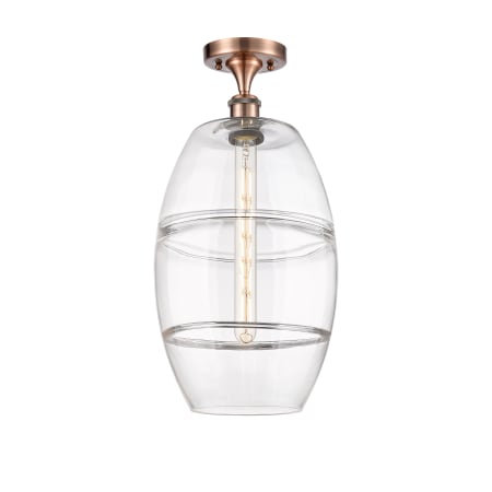 A large image of the Innovations Lighting 516-1C-20-10 Vaz Semi-Flush Antique Copper / Clear