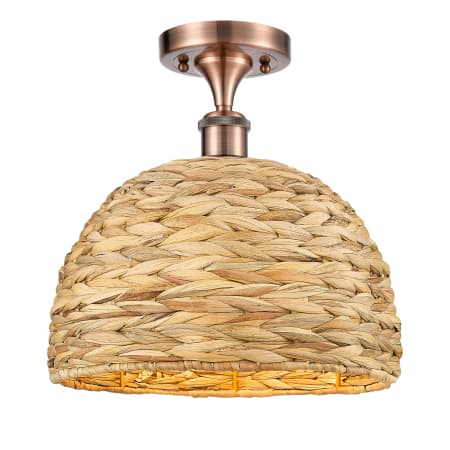 A large image of the Innovations Lighting 516-1C-13-12 Woven Rattan Semi-Flush Antique Copper / Natural