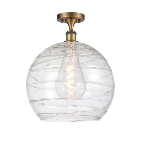 A large image of the Innovations Lighting 516-1C-17-14 Athens Semi-Flush Brushed Brass / Clear Deco Swirl