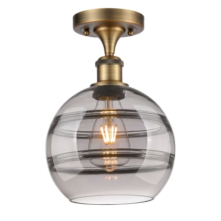 A large image of the Innovations Lighting 516-1C-12-8 Rochester Semi-Flush Brushed Brass / Smoked