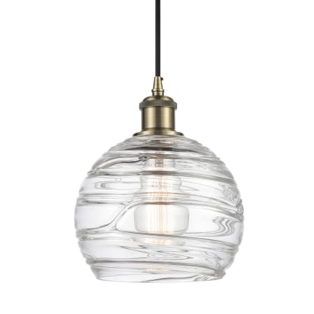 A large image of the Innovations Lighting 516-1P-10-8 Athens Pendant Clear Deco Swirl / Antique Brass