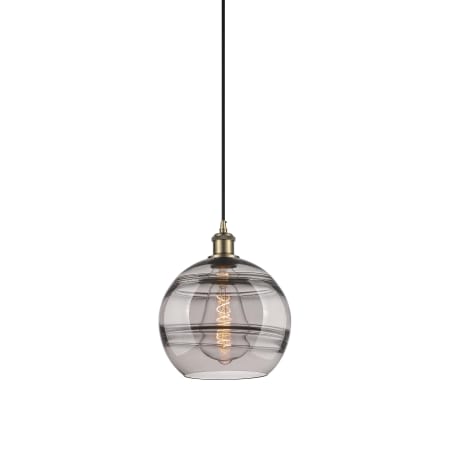 A large image of the Innovations Lighting 516-1P-12-10 Rochester Pendant Antique Brass / Smoked