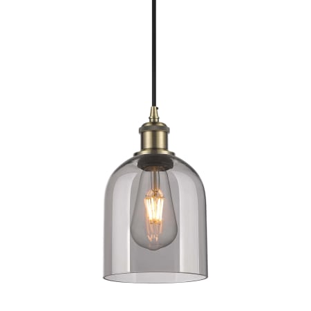 A large image of the Innovations Lighting 516-1P-10-6 Bella Pendant Antique Brass / Light Smoke