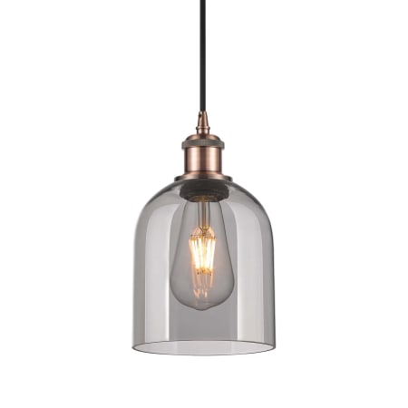 A large image of the Innovations Lighting 516-1P-10-6 Bella Pendant Antique Copper / Light Smoke