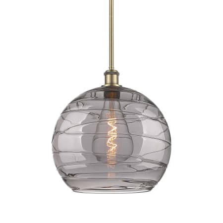 A large image of the Innovations Lighting 516-1S-16-14 Athens Deco Swirl Pendant Antique Brass / Light Smoke Deco Swirl