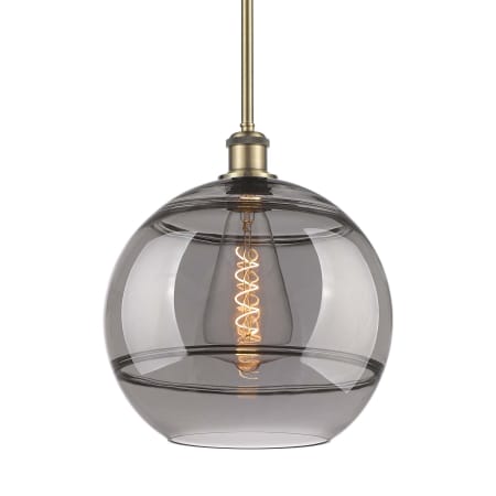 A large image of the Innovations Lighting 516-1S-14-12 Rochester Pendant Antique Brass / Light Smoke