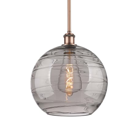 A large image of the Innovations Lighting 516-1S-14-12 Athens Deco Swirl Pendant Antique Copper / Light Smoke Deco Swirl